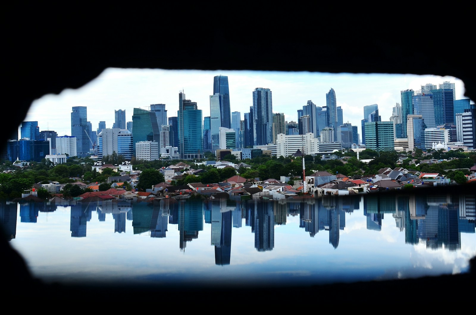 A view of a city from across a lake