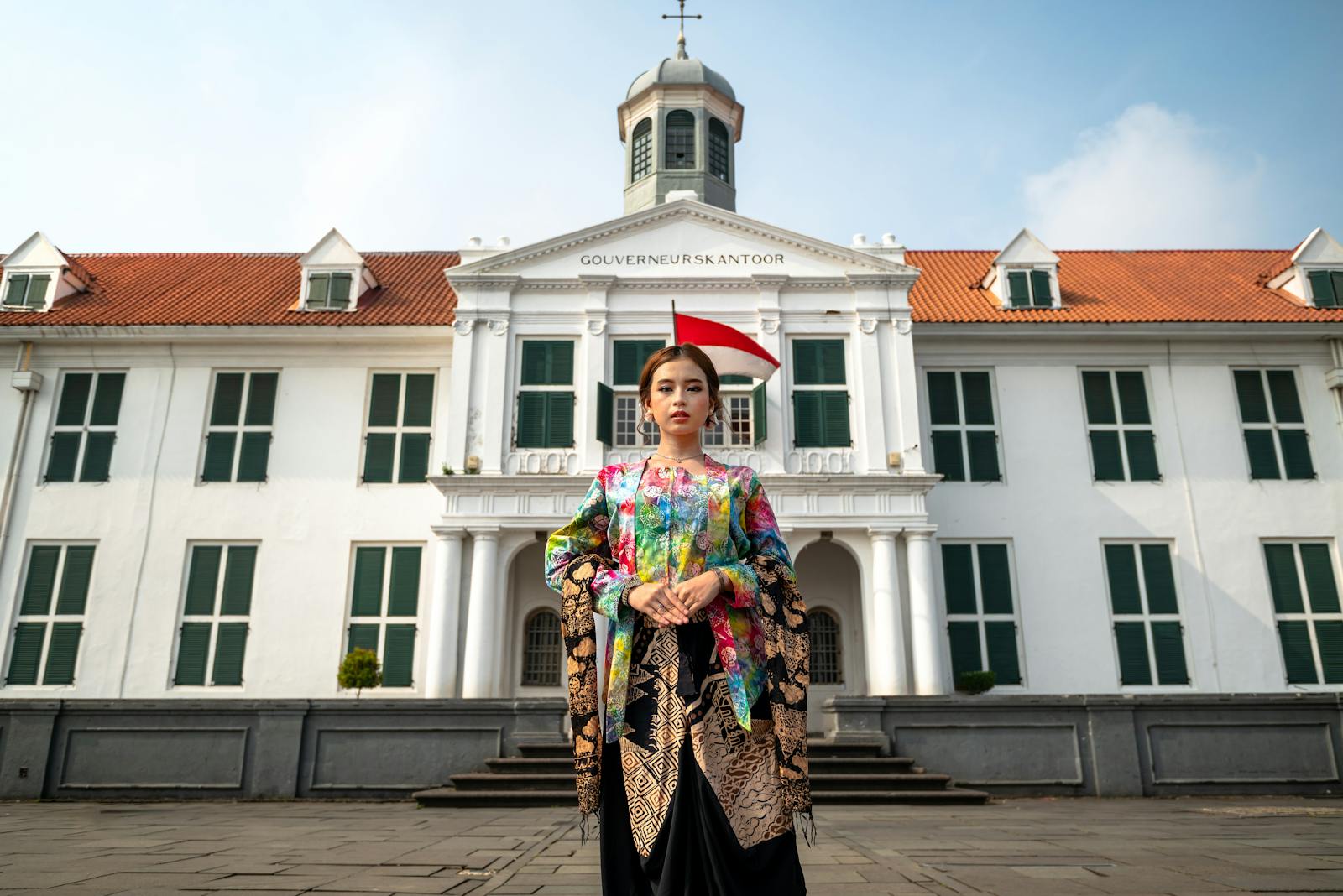 Portrait of a woman in kebaya at the historic Fatahillah Square, Jakarta.